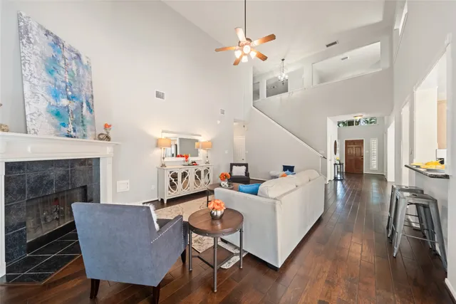 a large kitchen with stainless steel appliances granite countertop a stove a sink dishwasher and a microwave