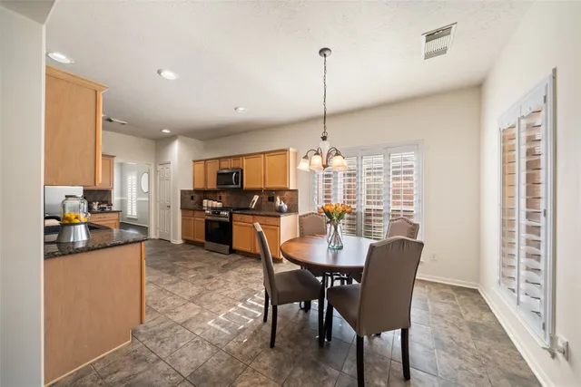 a bed room with a bed and a dresser