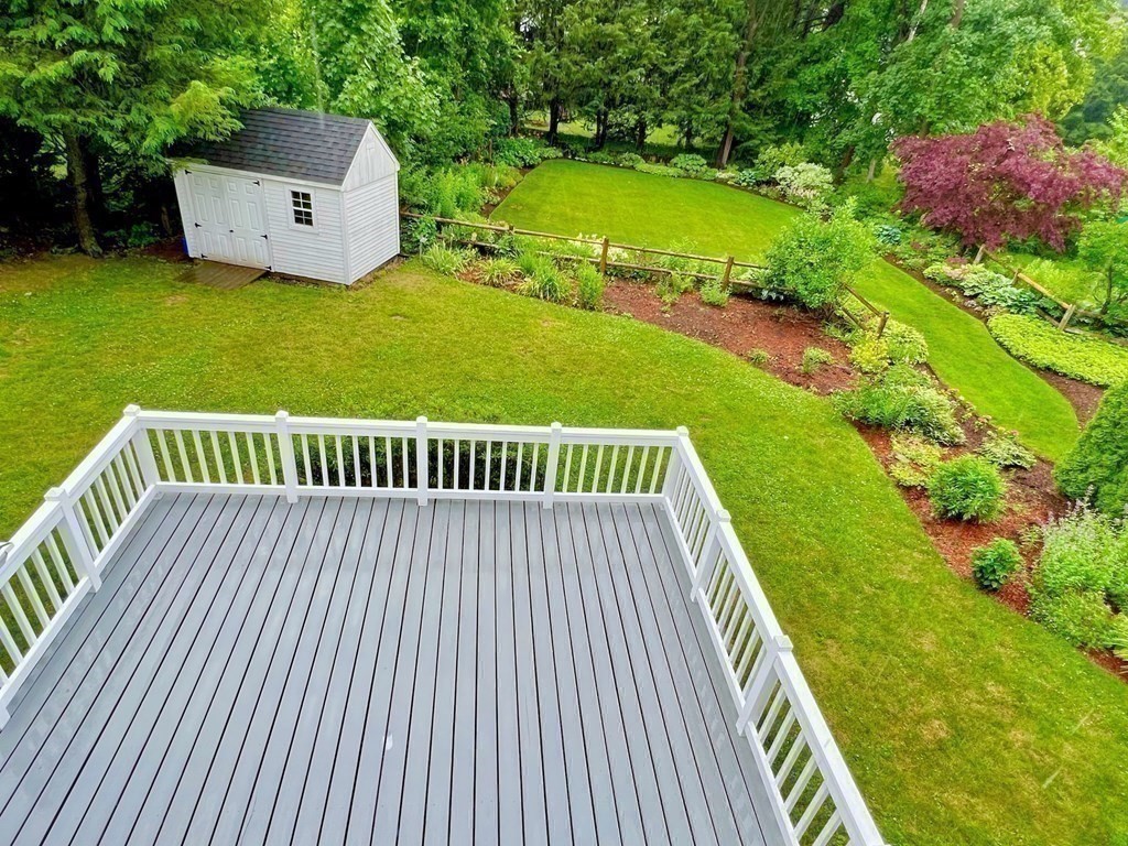 55 Forest Street Lexington, MA 02421 - Photo 34 of 39 a view of a balcony with a garden