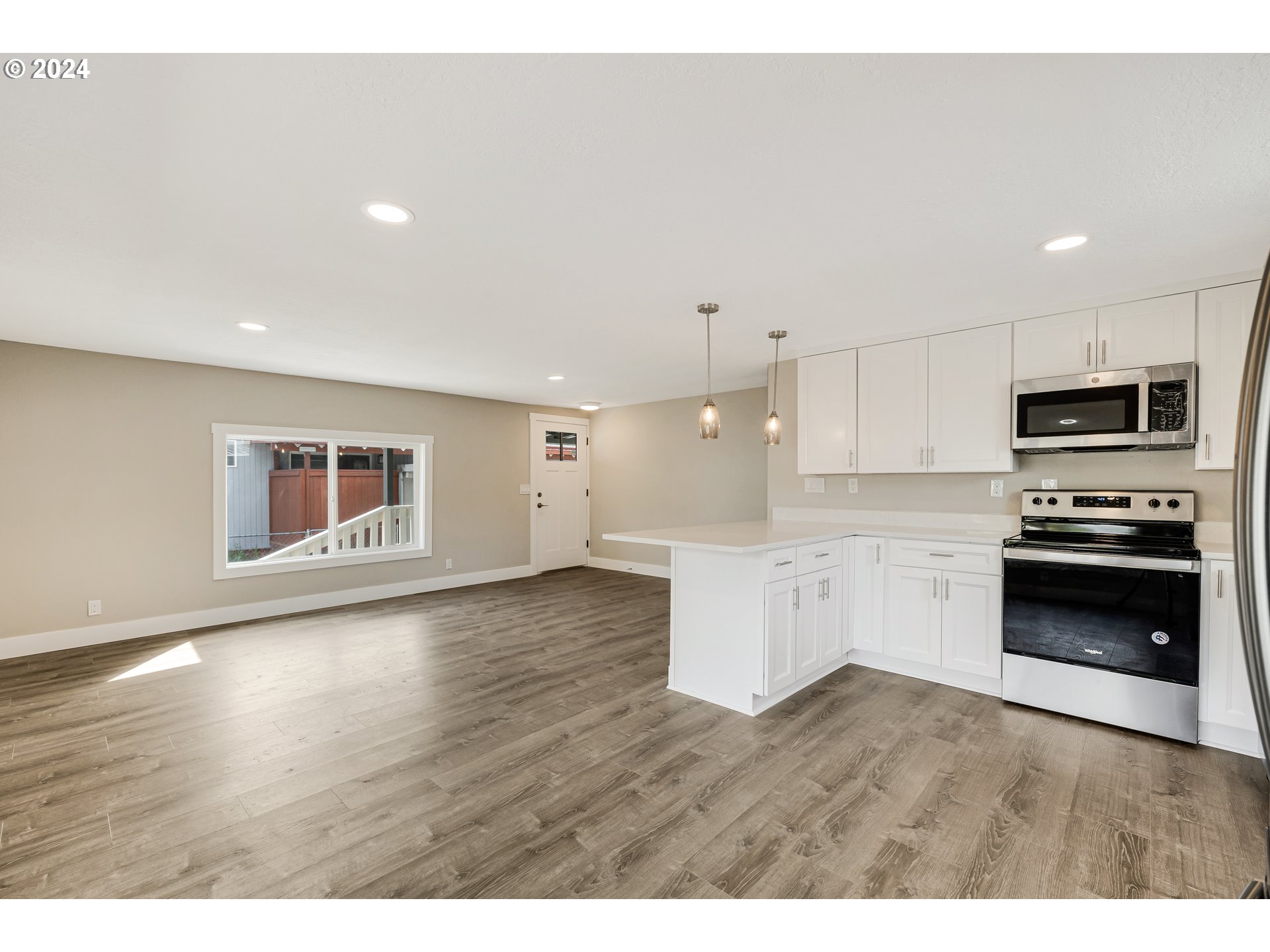 32968 Southwest Plum Tree Court Cornelius, OR 97113 - Photo 11 of 30 a kitchen with a sink and a stove top oven
