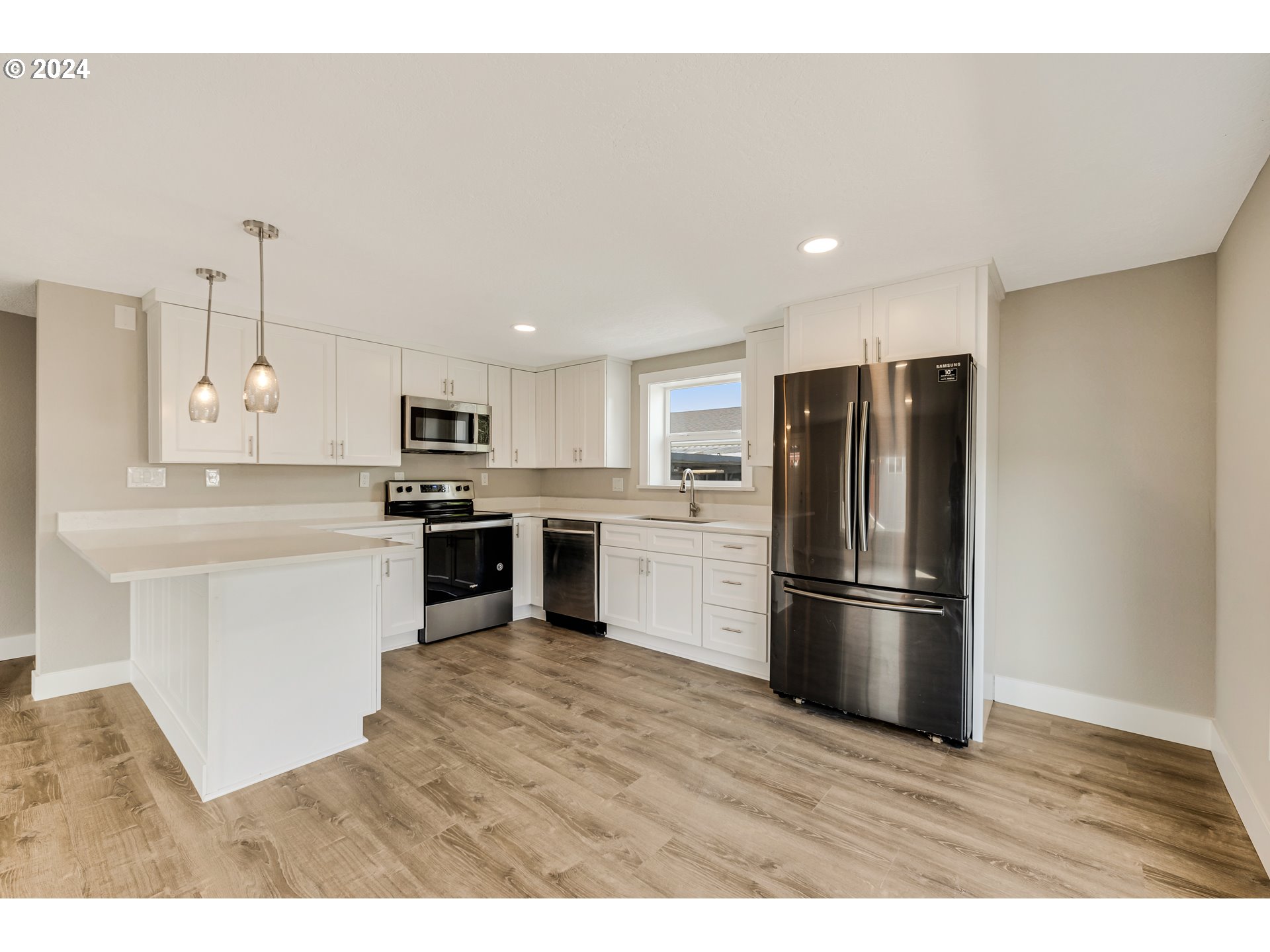 32968 Southwest Plum Tree Court Cornelius, OR 97113 - Photo 13 of 30 a kitchen with a refrigerator and a sink