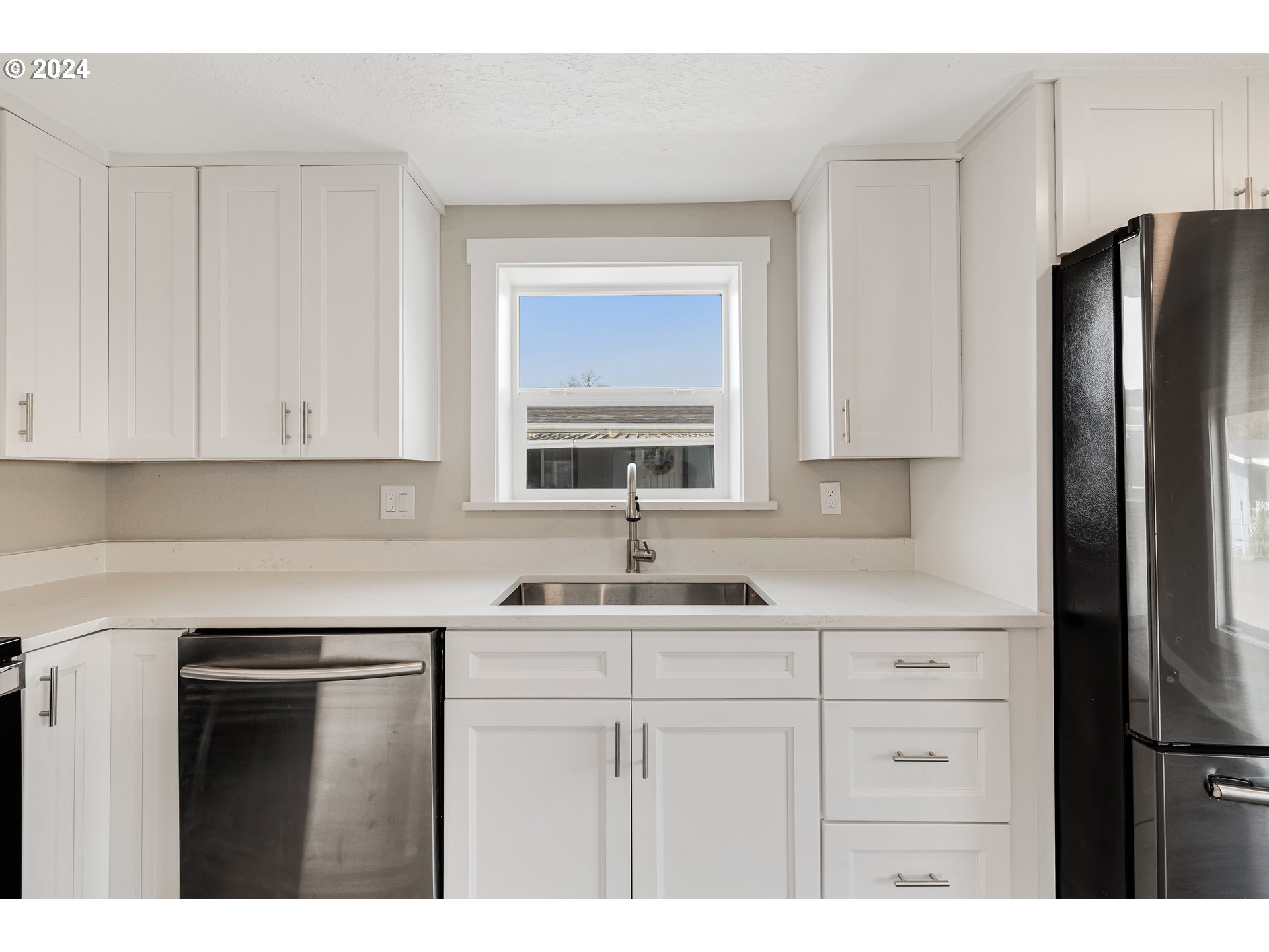 32968 Southwest Plum Tree Court Cornelius, OR 97113 - Photo 15 of 30 a kitchen with a sink and cabinets