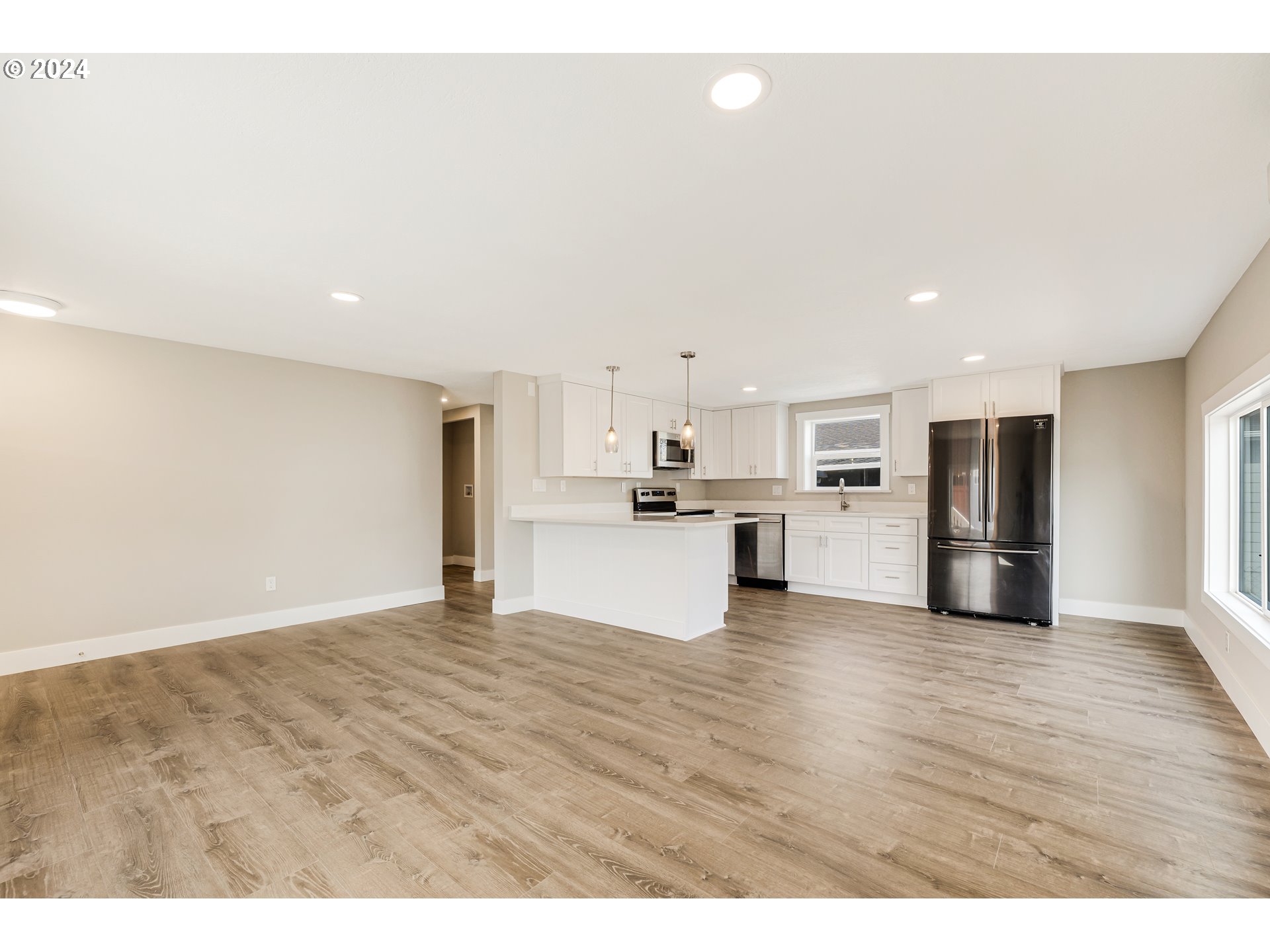 32968 Southwest Plum Tree Court Cornelius, OR 97113 - Photo 9 of 30 a view of kitchen with wooden floor