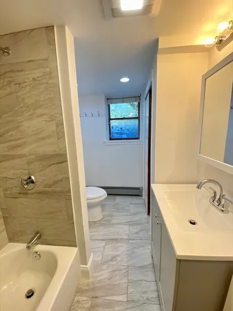 a bathroom with a sink and a tub