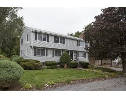 a house view with a garden space