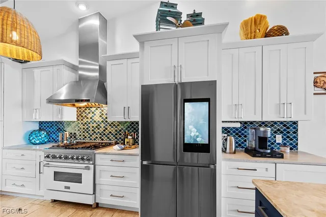 a kitchen with a stove and cabinets