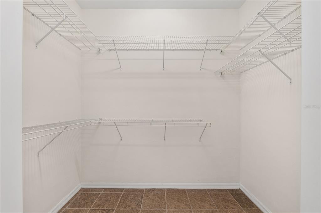 7982 Southwest 83rd Terrace Gainesville, FL 32608 - Photo 25 of 53 a view of a room with racks on the wall