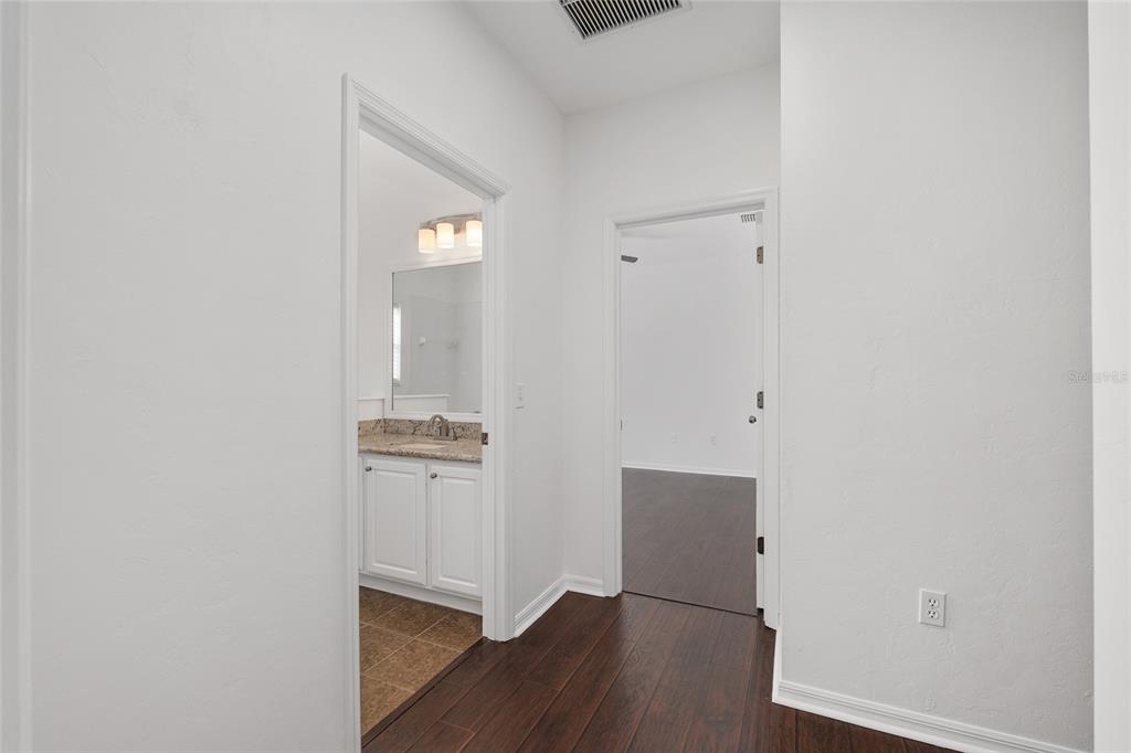 7982 Southwest 83rd Terrace Gainesville, FL 32608 - Photo 35 of 53 wooden floor in an empty room
