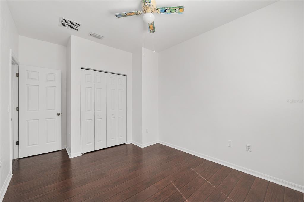 7982 Southwest 83rd Terrace Gainesville, FL 32608 - Photo 41 of 53 a view of an entryway with wooden floor