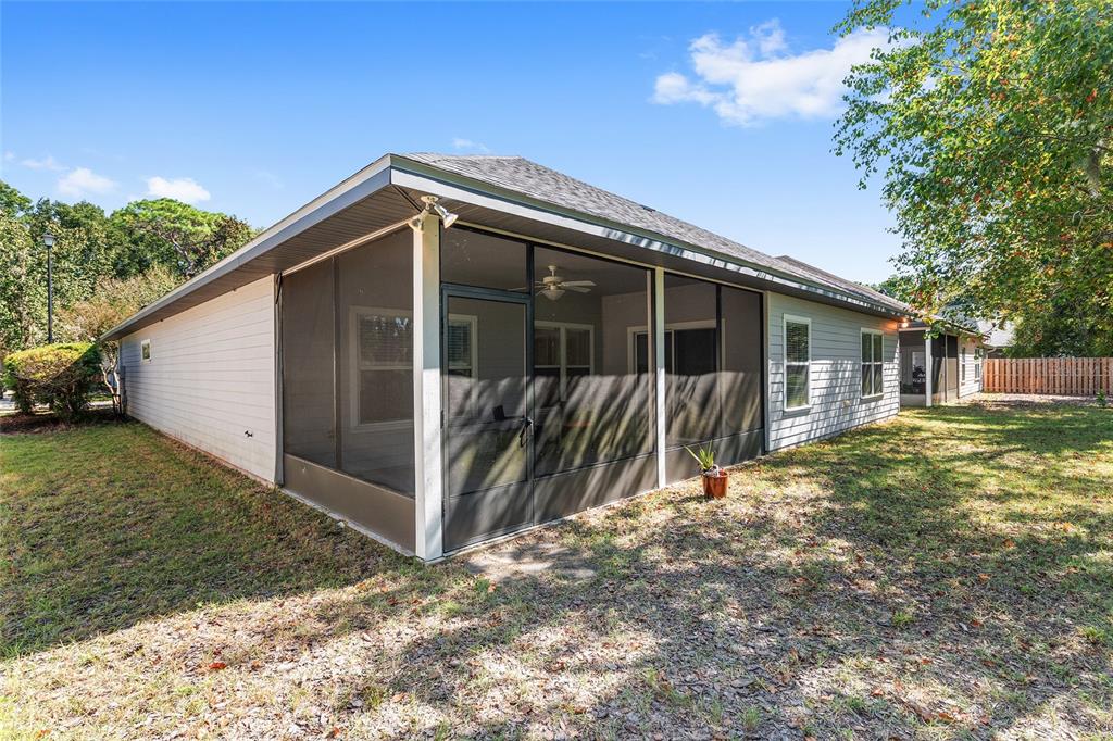 7982 Southwest 83rd Terrace Gainesville, FL 32608 - Photo 47 of 53 a view of a house with backyard and sitting area