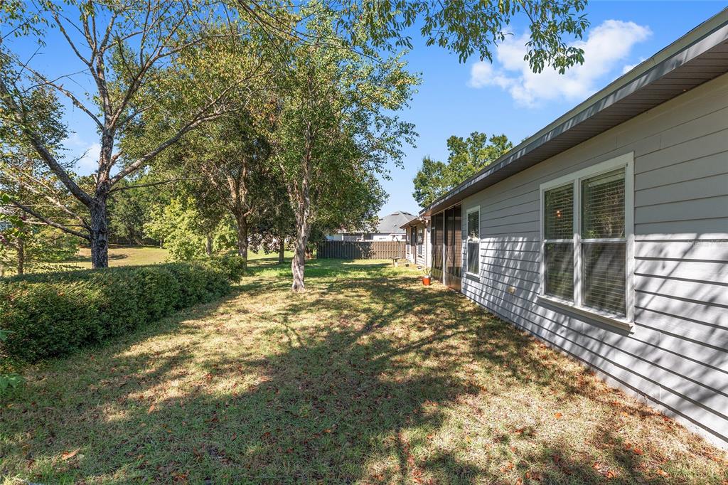7982 Southwest 83rd Terrace Gainesville, FL 32608 - Photo 50 of 53 a front view of a house with a yard