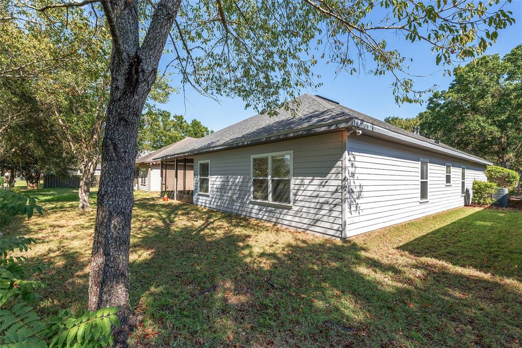 7982 Southwest 83rd Terrace Gainesville, FL 32608 - Photo 51 of 53 a view of a house with a yard