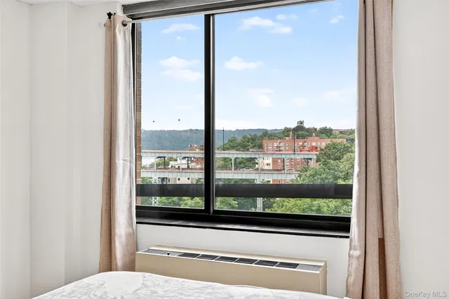 a view of balcony with wooden floor