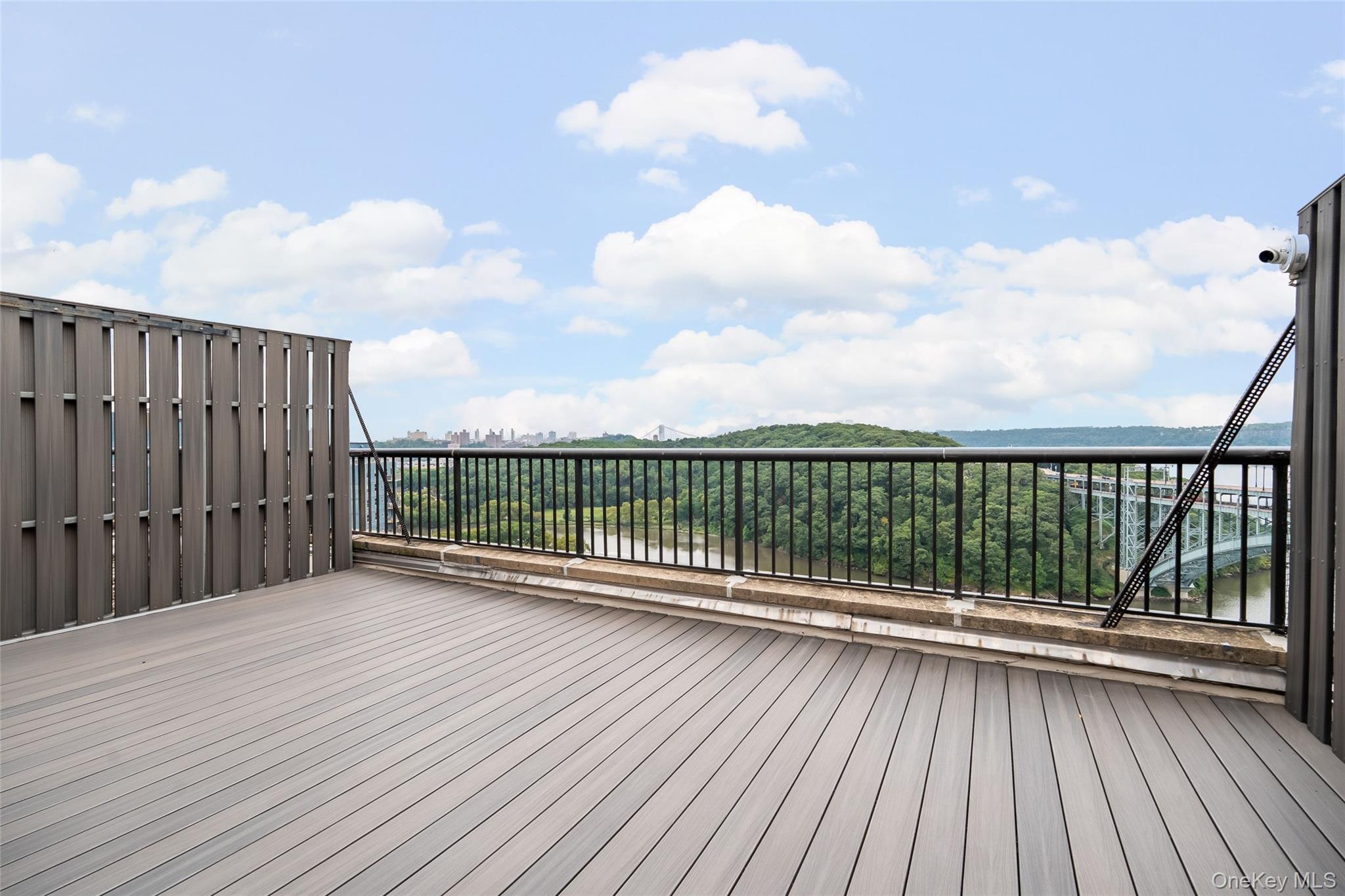 2287 Johnson Avenue, Unit 10B Bronx, NY 10463 - Photo 16 of 27 a view of balcony with wooden floor
