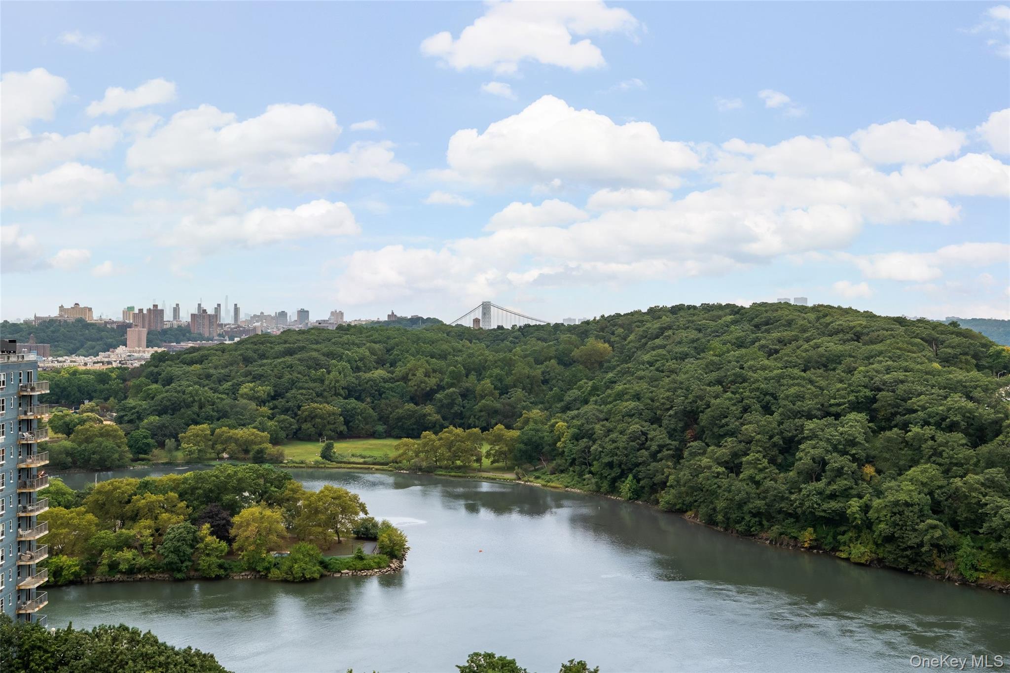 2287 Johnson Avenue, Unit 10B Bronx, NY 10463 - Photo 18 of 27 a view of a lake with houses in back
