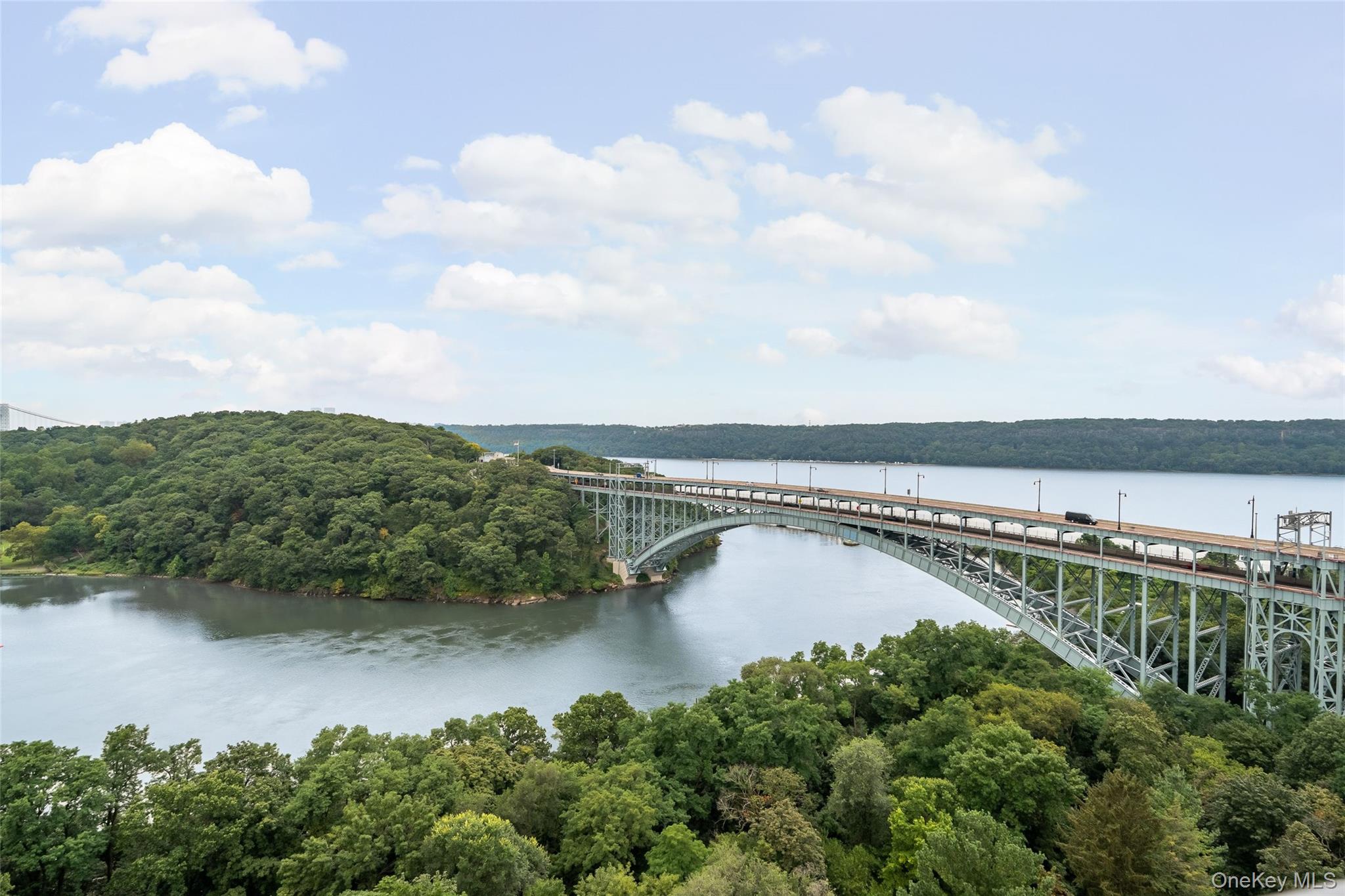 2287 Johnson Avenue, Unit 10B Bronx, NY 10463 - Photo 19 of 27 an aerial view of residential building and lake