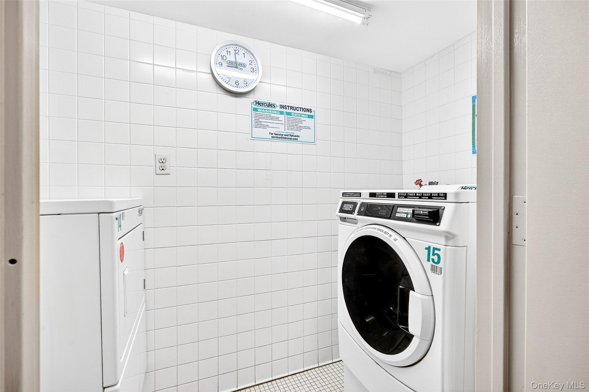 2287 Johnson Avenue, Unit 10B Bronx, NY 10463 - Photo 22 of 27 a utility room with dryer and washer