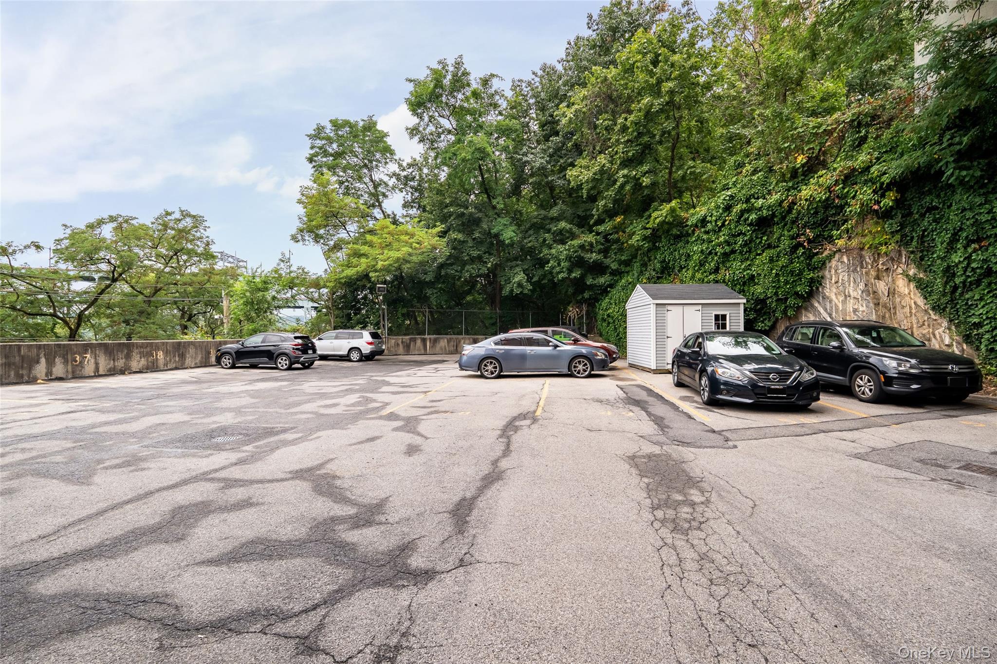 2287 Johnson Avenue, Unit 10B Bronx, NY 10463 - Photo 23 of 27 a view of street with parked cars