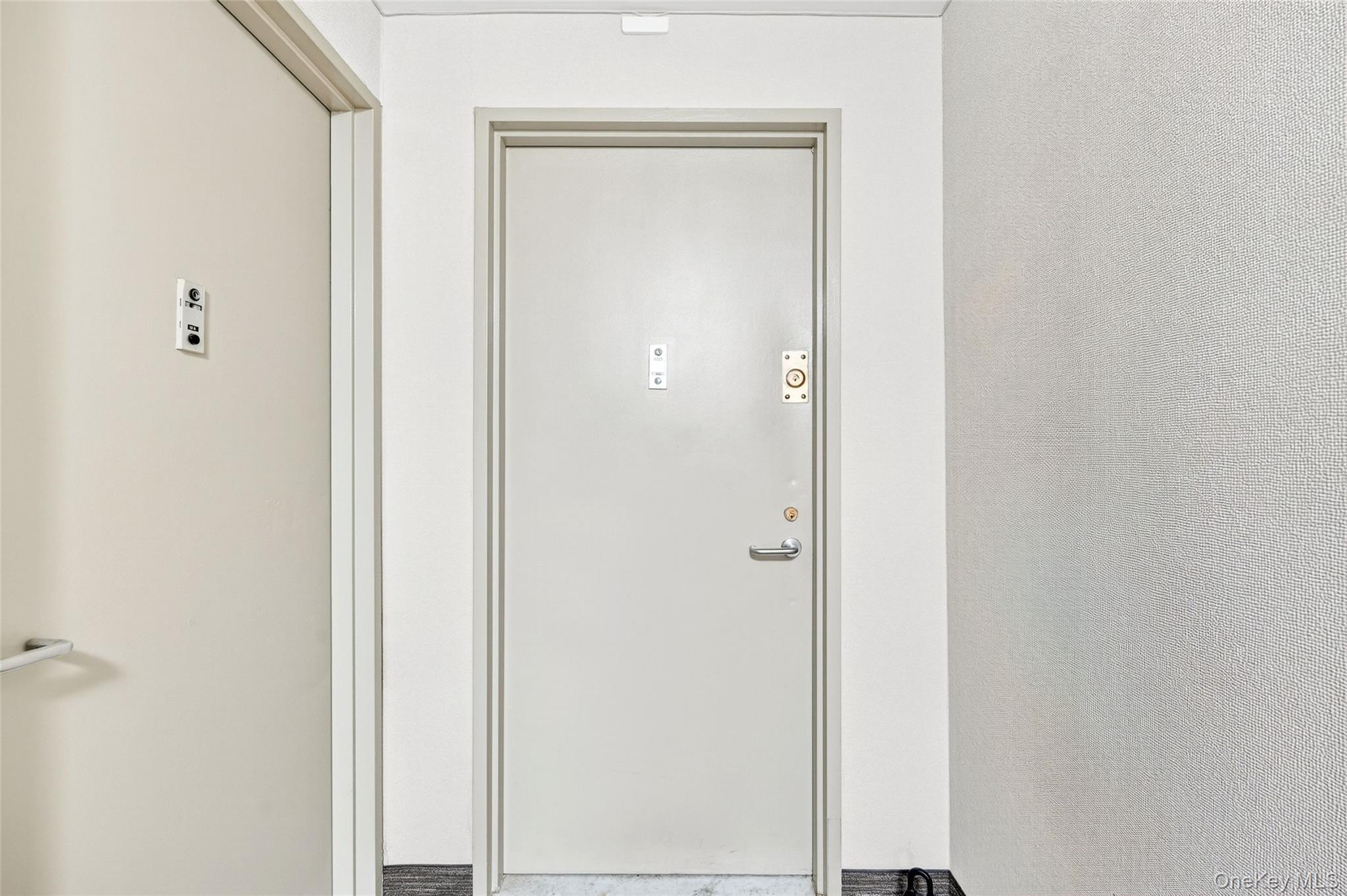 2287 Johnson Avenue, Unit 10B Bronx, NY 10463 - Photo 4 of 27 a view of a bathroom with a glass shower door