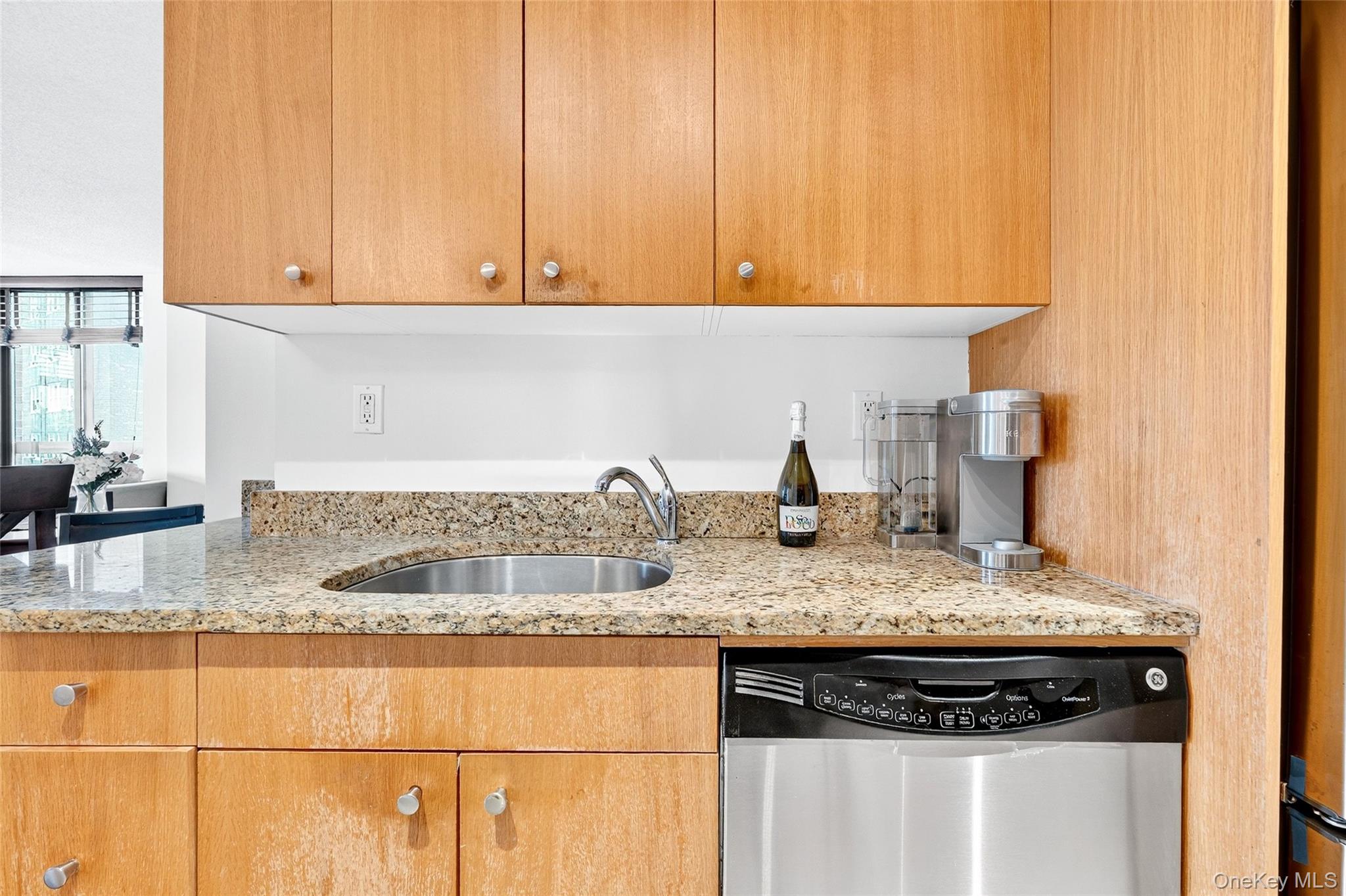 2287 Johnson Avenue, Unit 10B Bronx, NY 10463 - Photo 7 of 27 a kitchen with a sink and cabinets