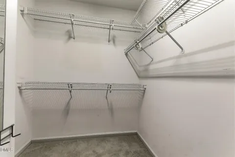 a view of a room with racks on the wall