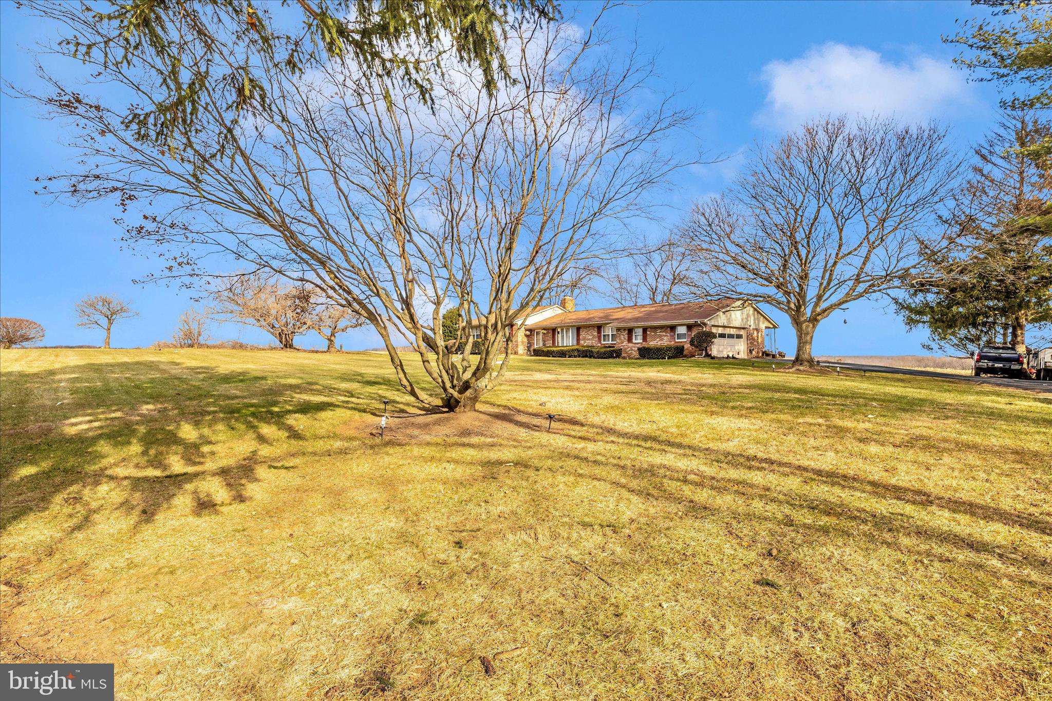 25801 Long Corner Road Gaithersburg, MD 20882 - Photo 2 of 52 a view of a yard with a house