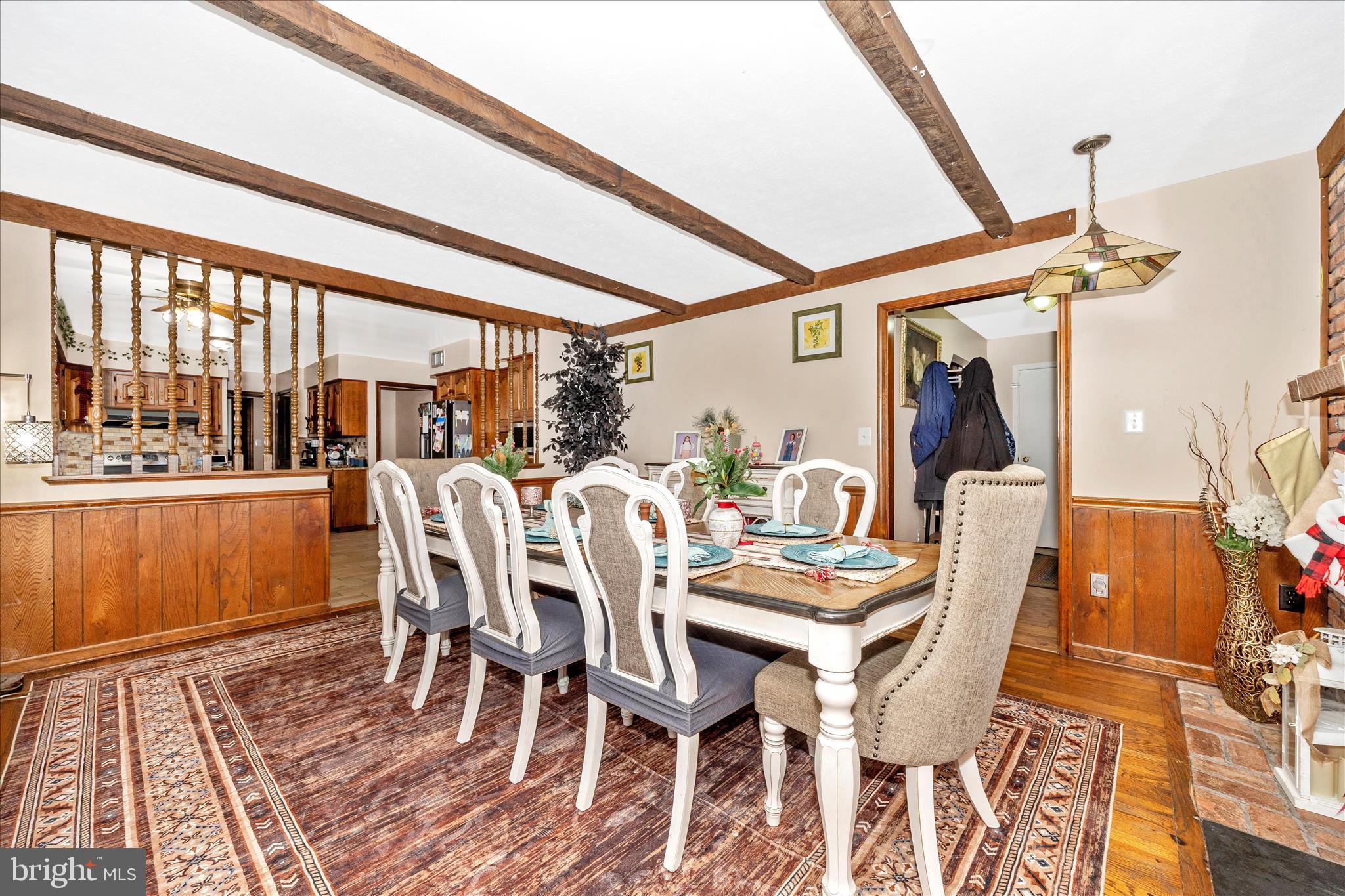 25801 Long Corner Road Gaithersburg, MD 20882 - Photo 27 of 52 a dining room with furniture and wooden floor