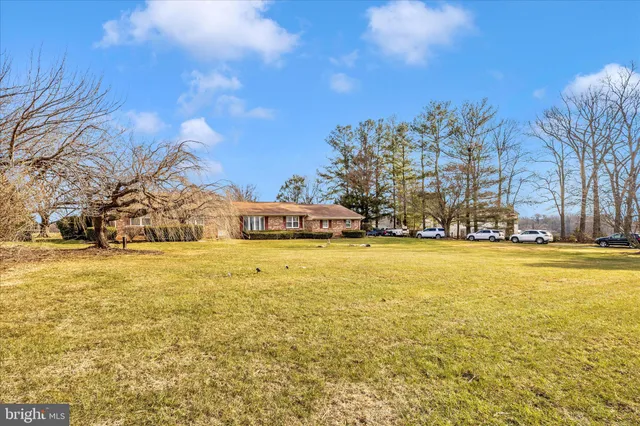 a view of a house with a swimming pool