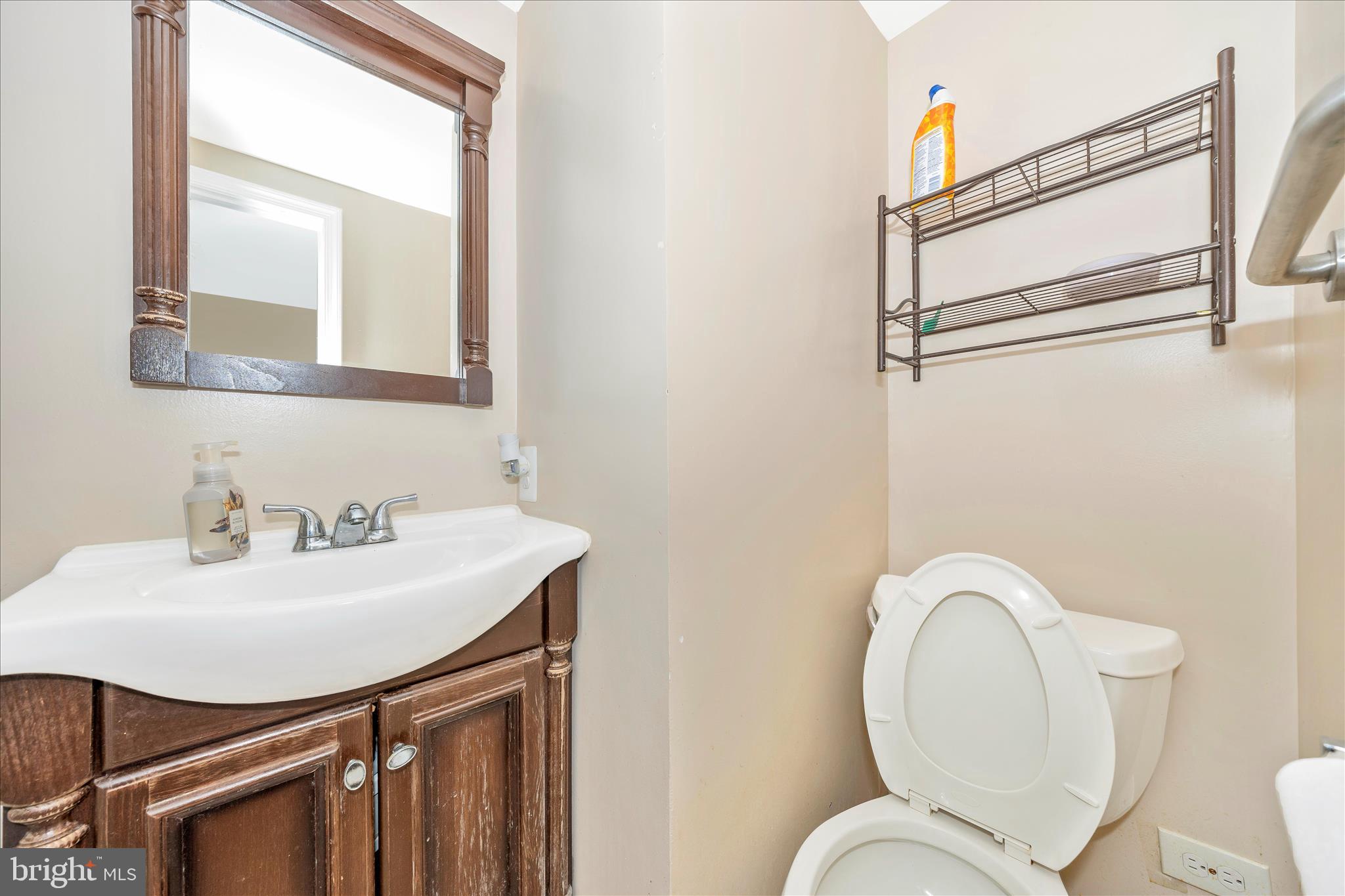 25801 Long Corner Road Gaithersburg, MD 20882 - Photo 51 of 52 a bathroom with a toilet sink and mirror