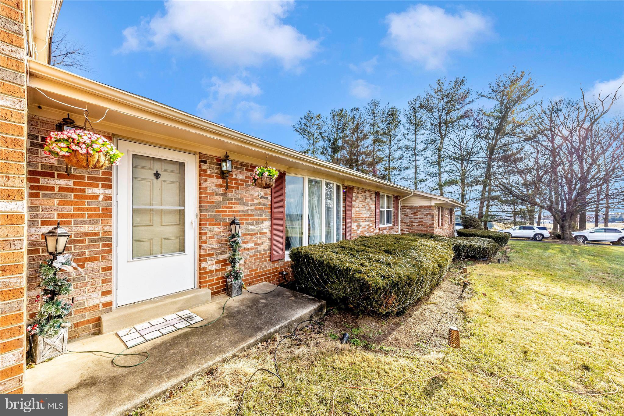 25801 Long Corner Road Gaithersburg, MD 20882 - Photo 6 of 52 a front view of a house with a yard