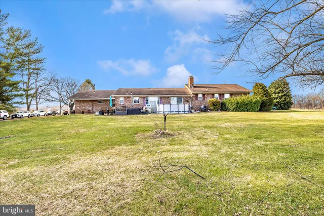 a view of a swimming pool with an outdoor space