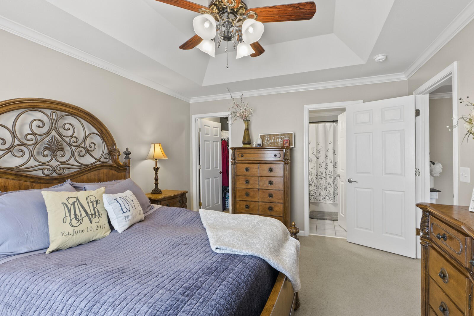 4347 Airport Road Springfield, TN 37172 - Photo 8 of 37 a bedroom with a large bed and a chandelier