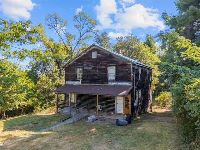 view of a lake with mountains in the background