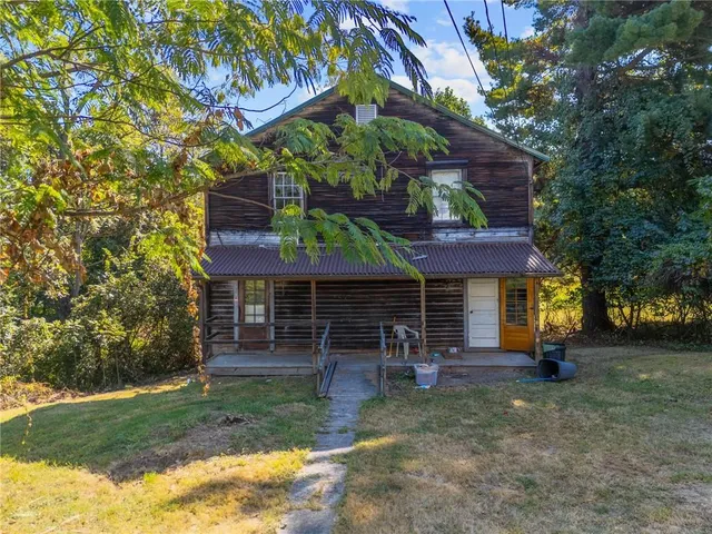 a view of outdoor space with deck and yard