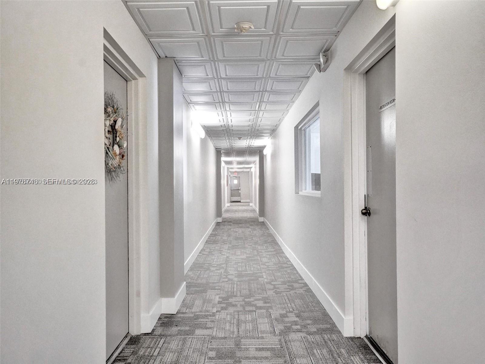 400 North Riverside Drive, Unit 410 Pompano Beach, FL 33062 - Photo 45 of 70 new hallway carpets and lighting