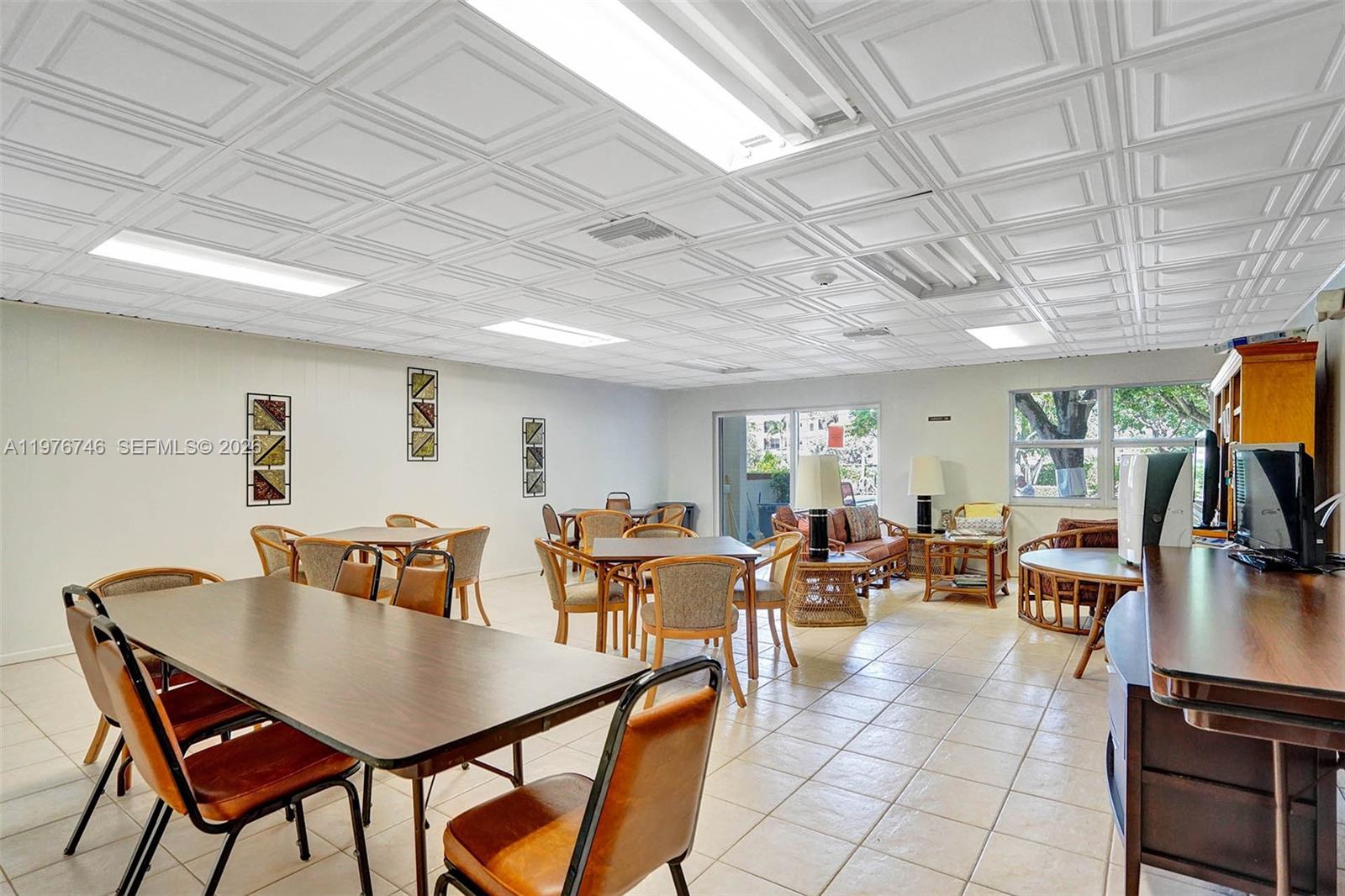 400 North Riverside Drive, Unit 410 Pompano Beach, FL 33062 - Photo 46 of 70 COMMUNITY ROOM OFF POOL