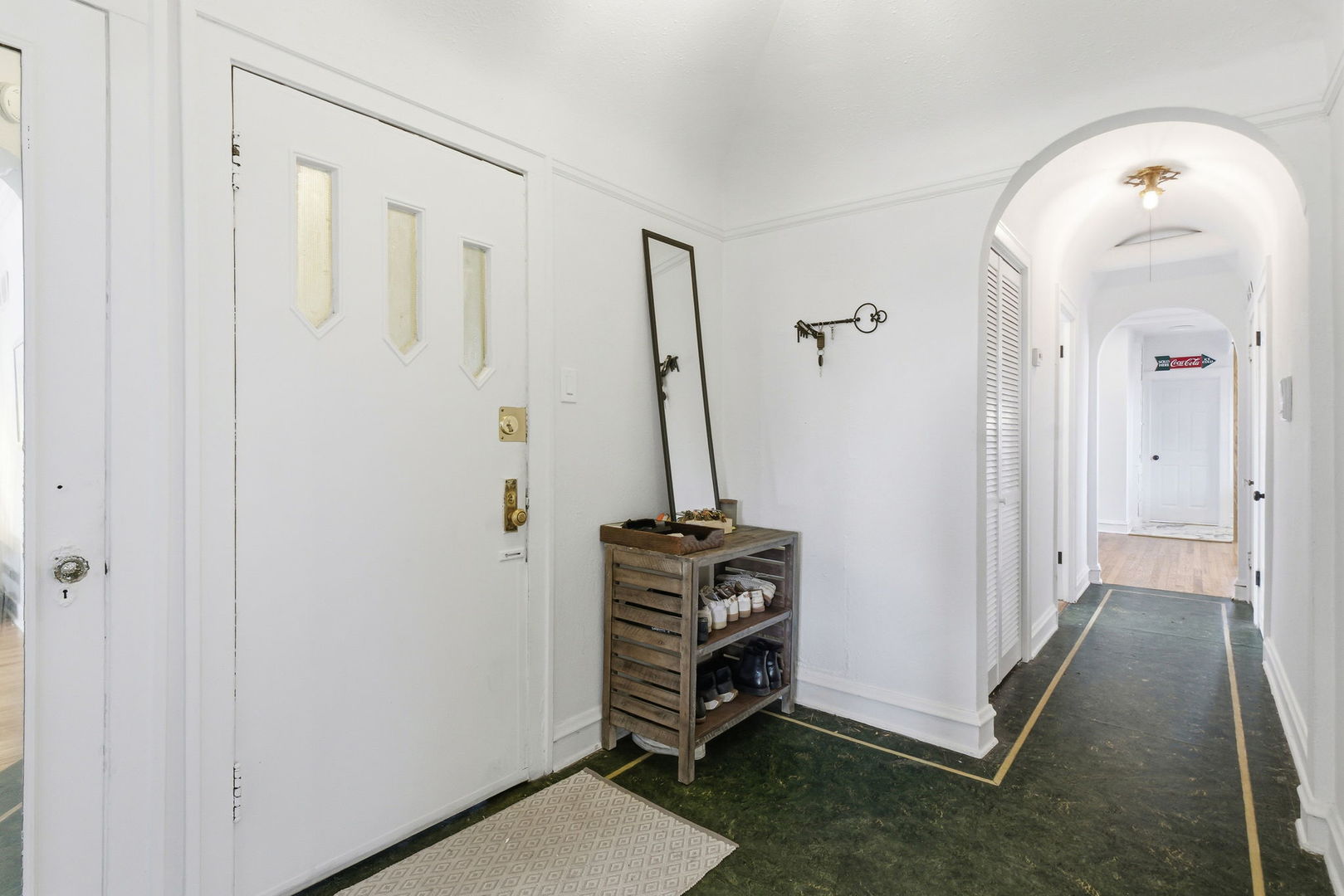 3414 West Medill Avenue, Unit 3 Chicago, IL 60647 - Photo 2 of 19 a view of a livingroom with furniture and staircase