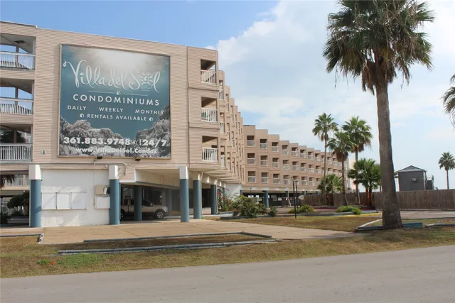 a view of a building with a street