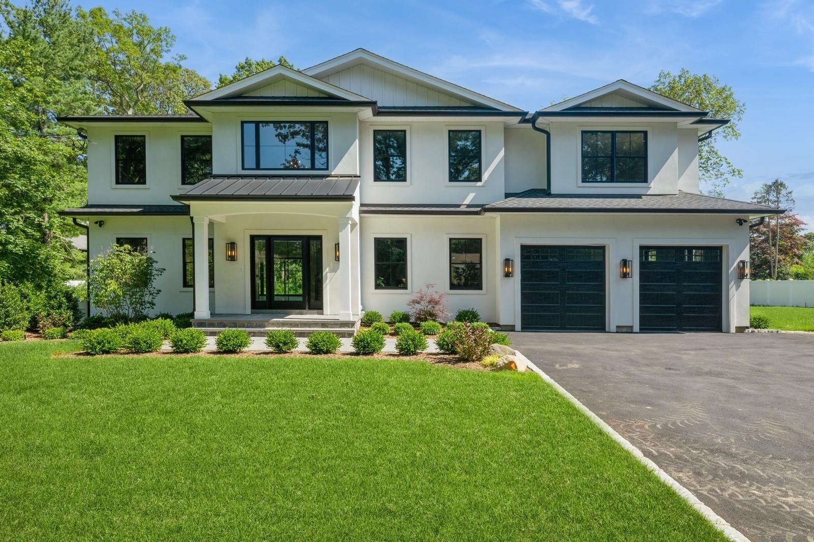 352 Cold Spring Road Syosset, NY 11791 - Photo 2 of 39 front view of a house with a yard