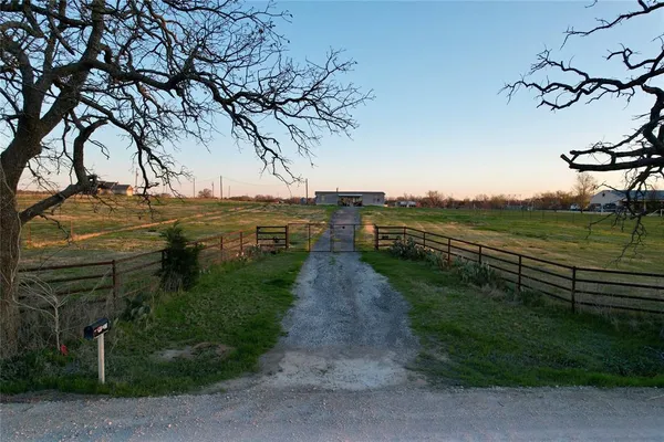 a view of a lake with a garden