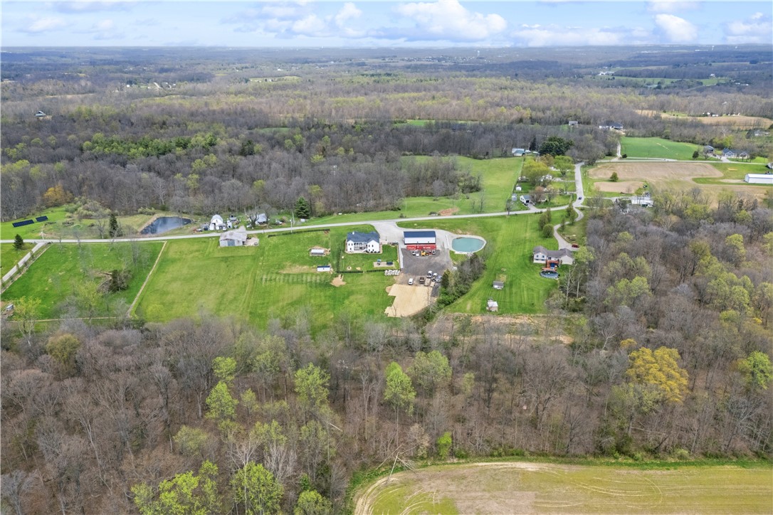 1158 Pyle Road Clarksville, OH 45113 - Photo 71 of 76 This sprawling estate offers expansive grounds, a private pond, and ample space for diverse outdoor activities.