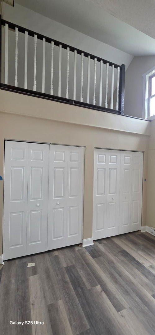 10102 Main Street, Unit 2B Hebron, IL 60034 - Photo 12 of 18 a view of entryway with wooden floor