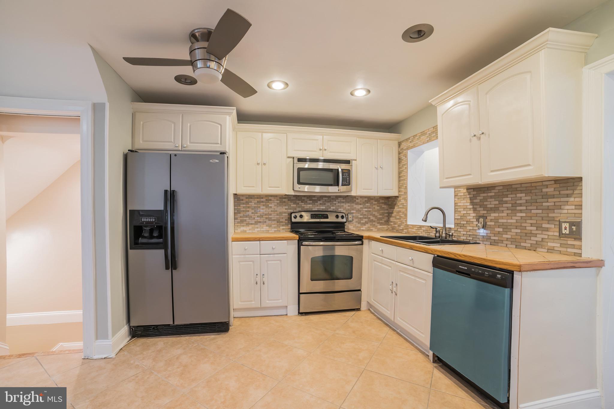 1310 Brixton Road Baltimore, MD 21239 - Photo 11 of 30 Updated kitchen with stainless steel appliances