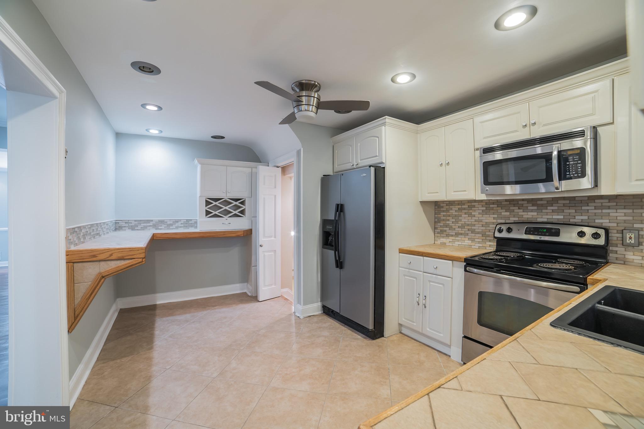 1310 Brixton Road Baltimore, MD 21239 - Photo 12 of 30 Updated kitchen with stainless steel appliances