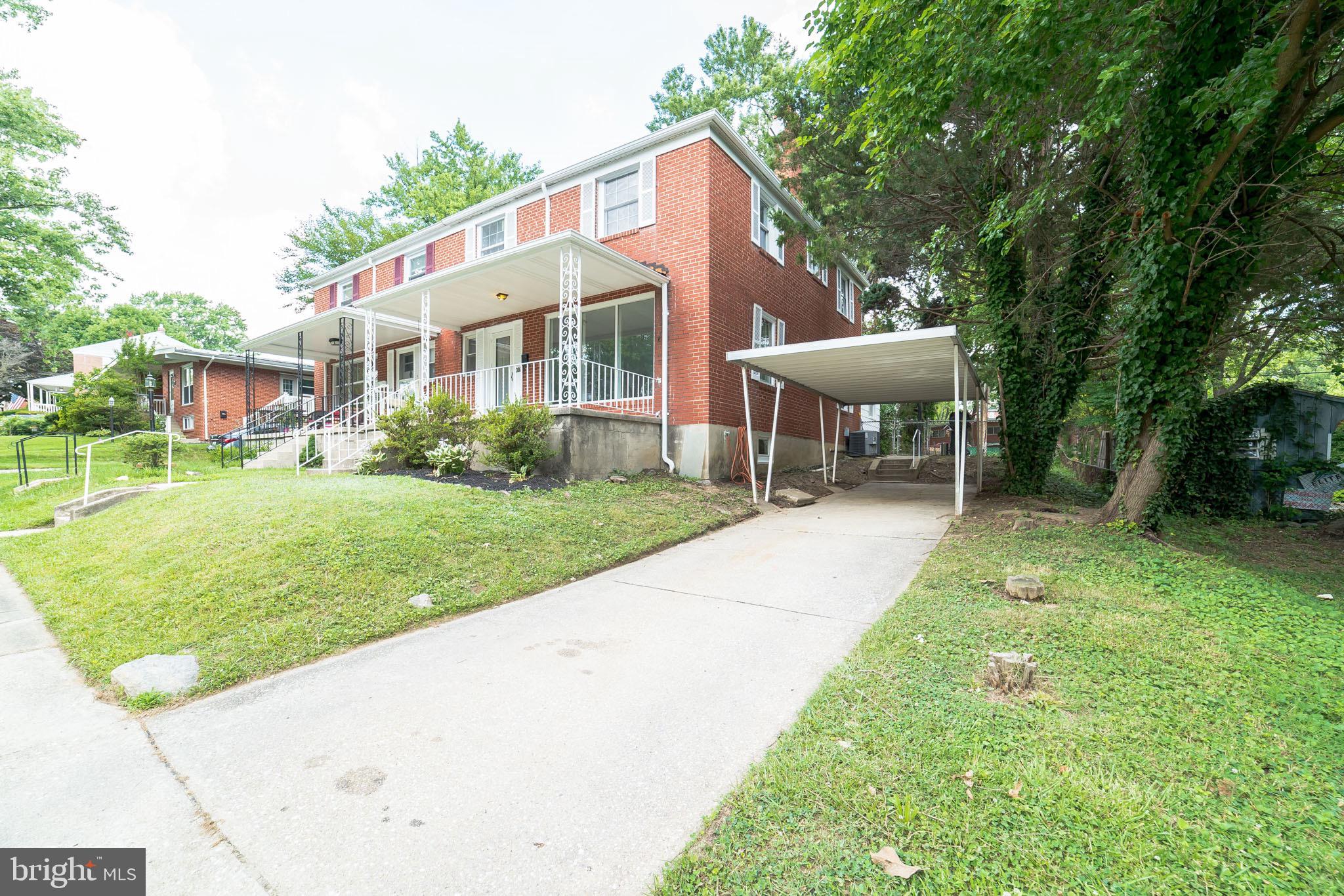 1310 Brixton Road Baltimore, MD 21239 - Photo 3 of 30 Driveway with attached carport