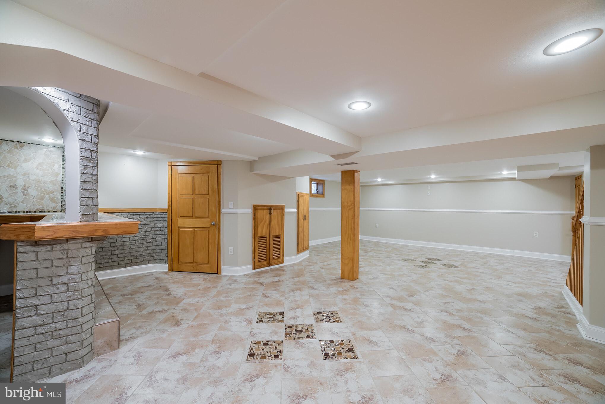 1310 Brixton Road Baltimore, MD 21239 - Photo 24 of 30 Finished basement with built in bar