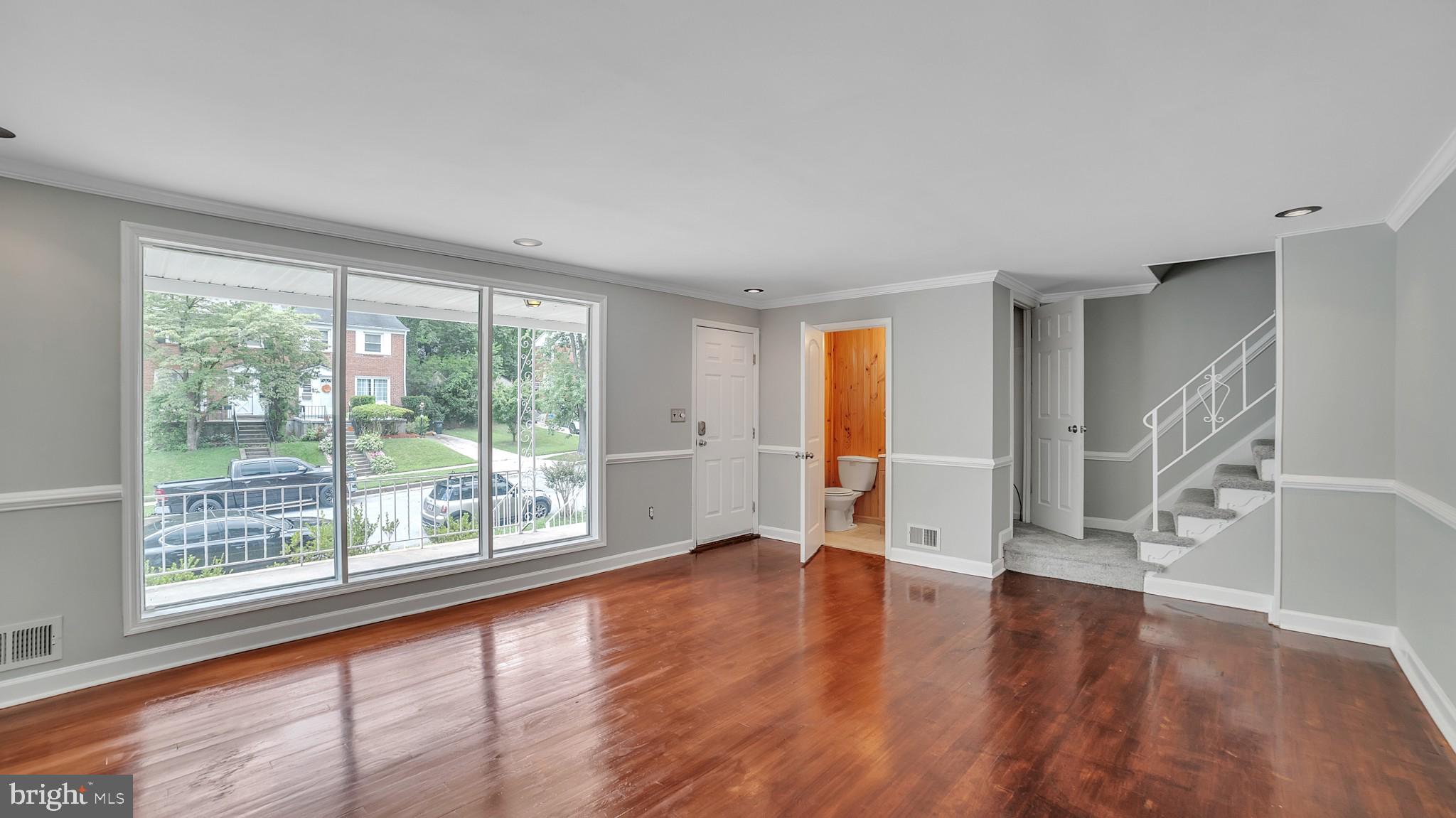 1310 Brixton Road Baltimore, MD 21239 - Photo 6 of 30 Large windows, let in plenty of natural light