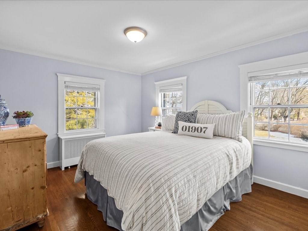 31 Estabrook Road Swampscott, MA 01907 - Photo 27 of 42 a bedroom with a bed and wooden floor