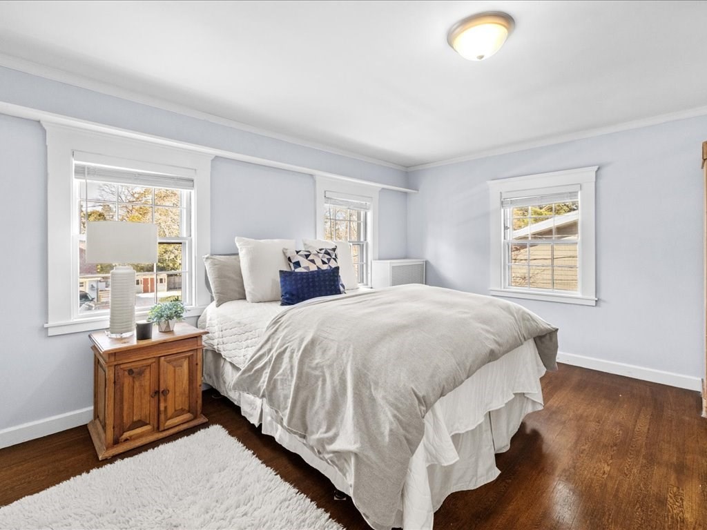31 Estabrook Road Swampscott, MA 01907 - Photo 29 of 42 a spacious bedroom with a bed and wooden floor