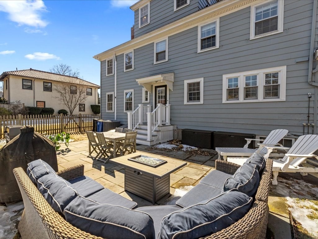 31 Estabrook Road Swampscott, MA 01907 - Photo 35 of 42 a view of a patio with couches table and chairs with wooden floor